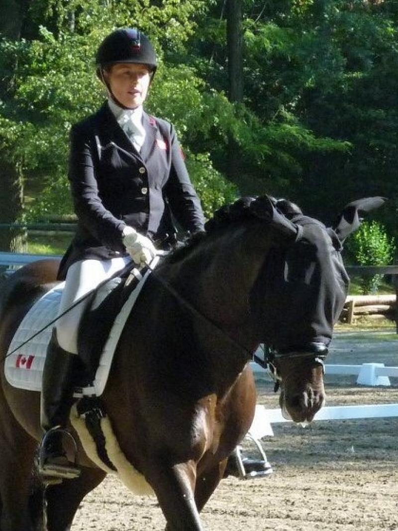 Woman riding a horse