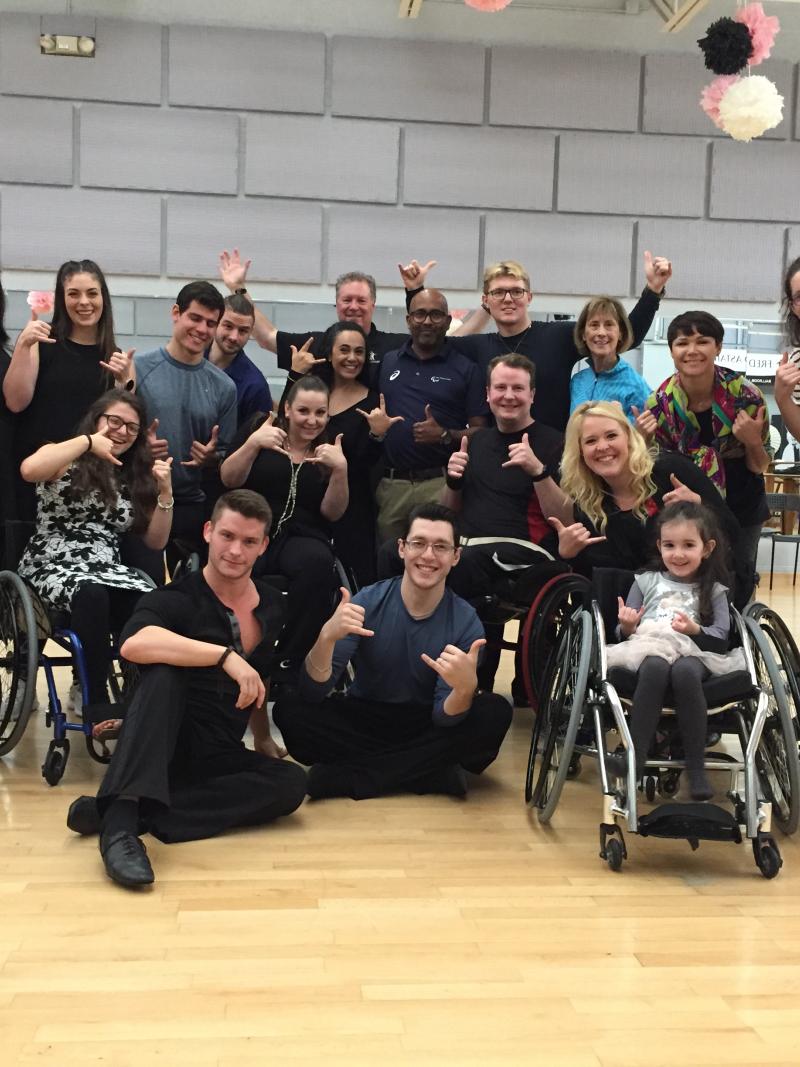 Group of Para dancers and instructors pose for a photo