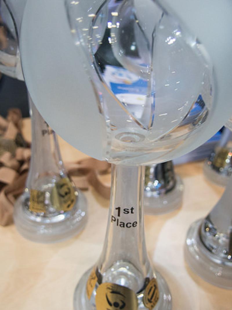 Glass-looking trophies for sitting volleyball World Championships medallists