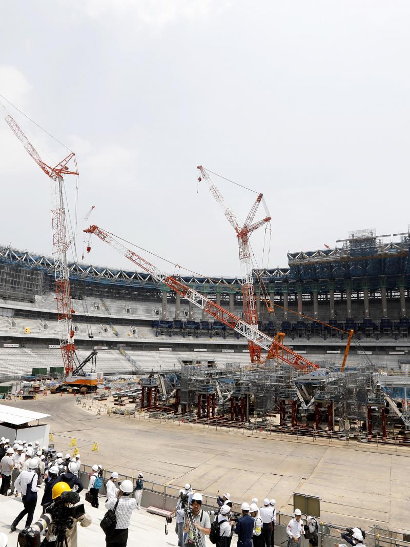 a wide shot of the Tokyo 2020 Olympic Stadium under construction