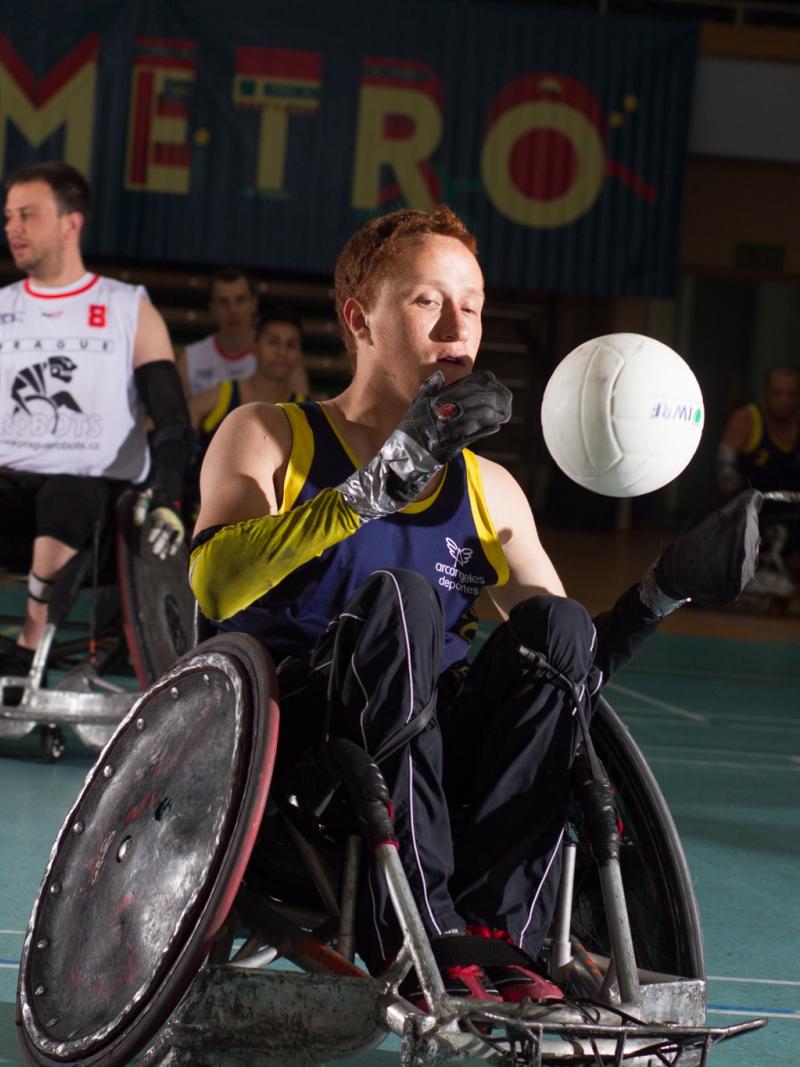 male wheelchair rugby player Carlos Neme with the ball