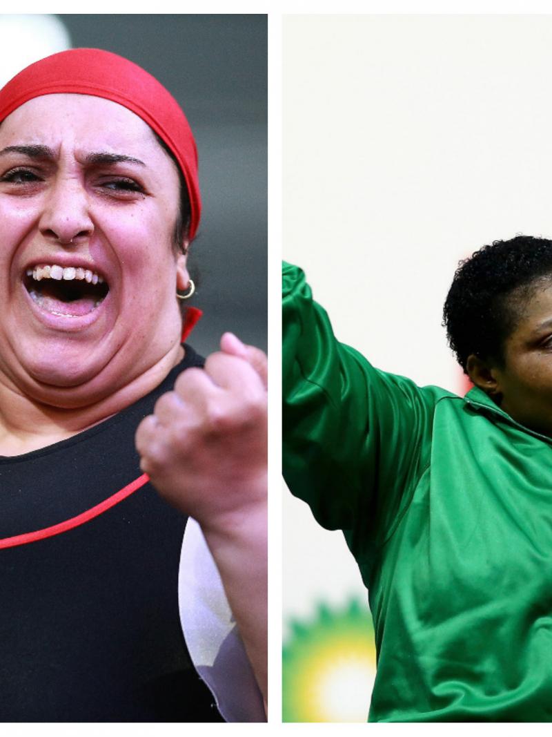 Female powerlifters Randa Mahmoud and Loveline Obiji saluting the crowd