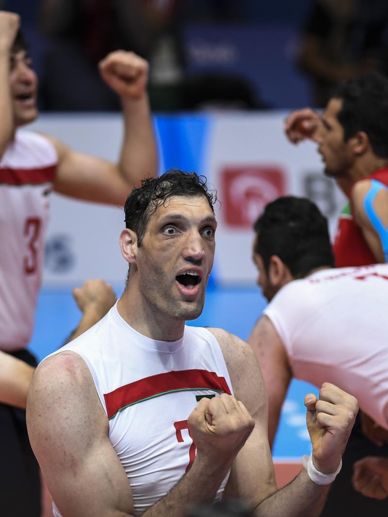 male sitting volleyball player Morteza Mehrzadselakjani celebrating a point