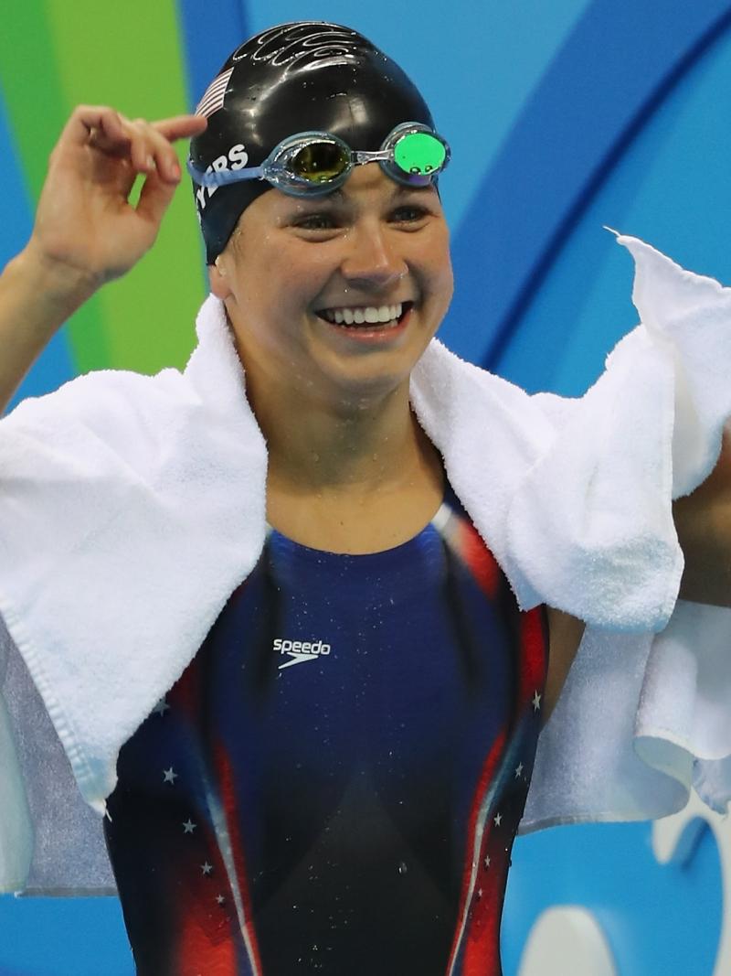 female Para swimmer Rebecca Meyers celebrates after getting out of the pool
