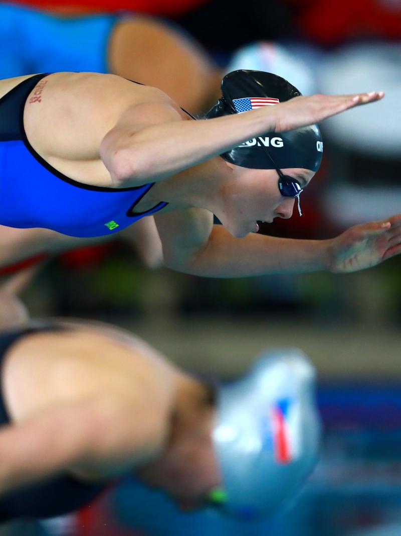 female Para swimmer Jessica Long dives into the swimming pool