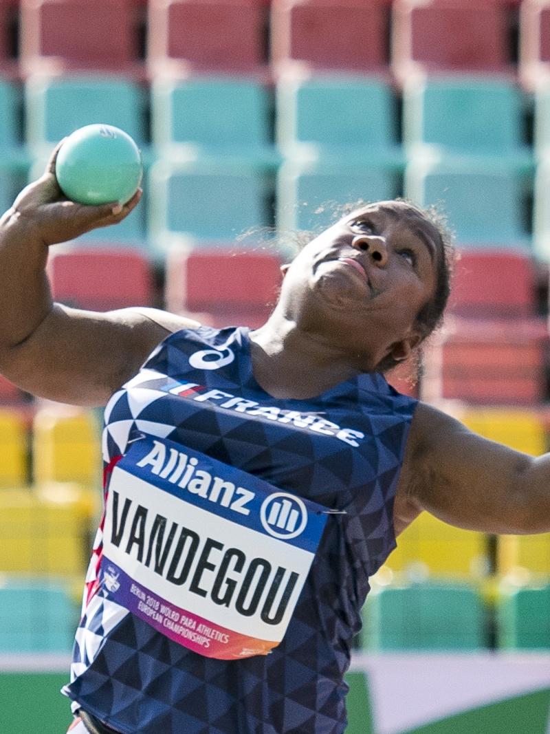 female Para athlete Rose Vandegou prepares to throw the shot put