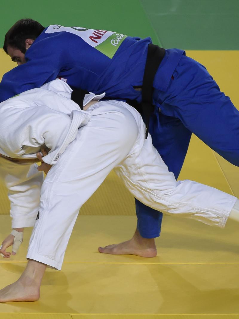Georgia's Zviad Gogotchuri battles with Ukraine's Oleksandr Nazarenko during the men's -90kg judo gold medal match at the Rio 2016 Paralympic Games.