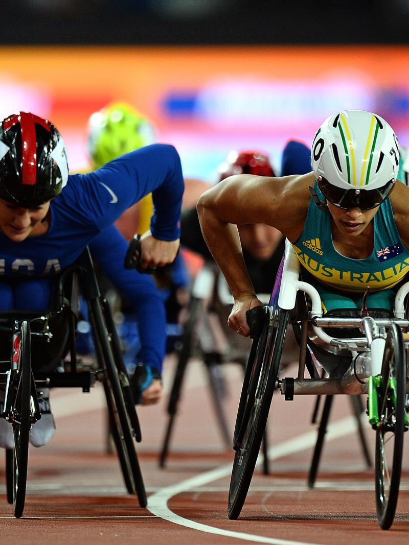 female wheelchair racers Tatyana McFadden and Madison de Rozario going head to head on the track