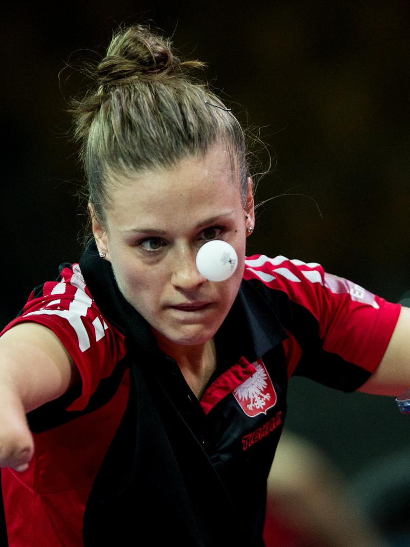 Natalia Partyka competing at the Para Table Tennis World Championships, holding the bat and watching the ball closely