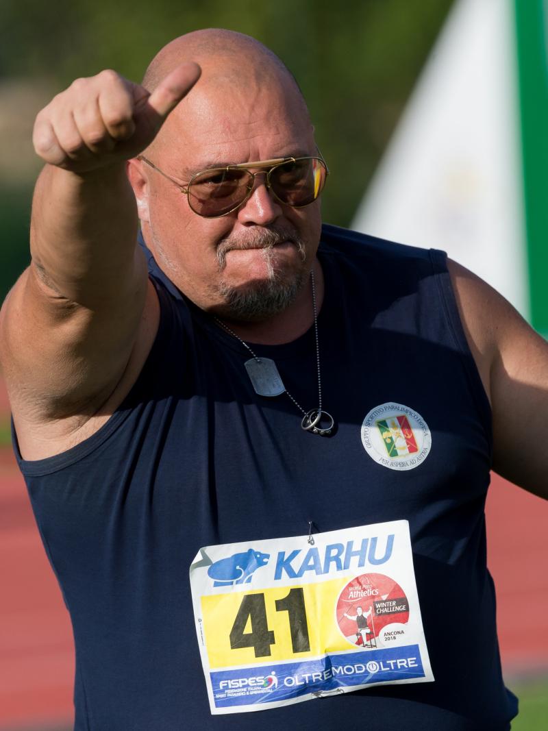 Giuseppe Campoccio holding the javelin