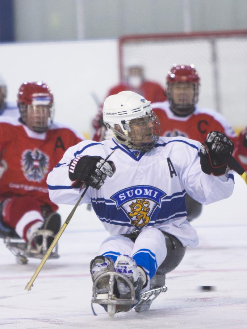 A man on a sledge hockey