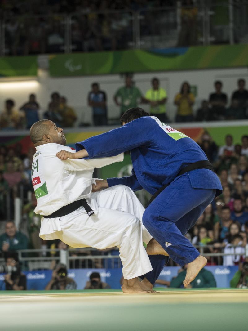 two judoka fighting on the mat