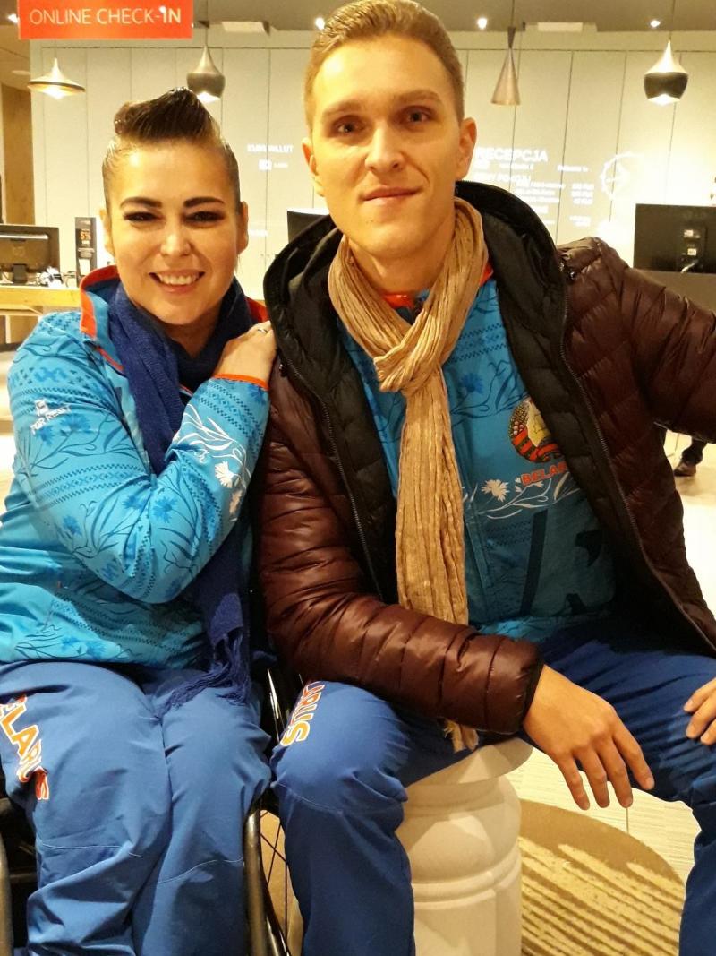 female Para dancer Hanna Harchakova and male Para dancer Roman Usmanov sitting together