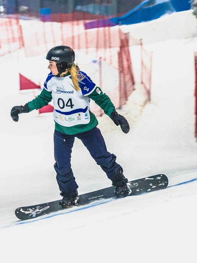 Woman snowboarding