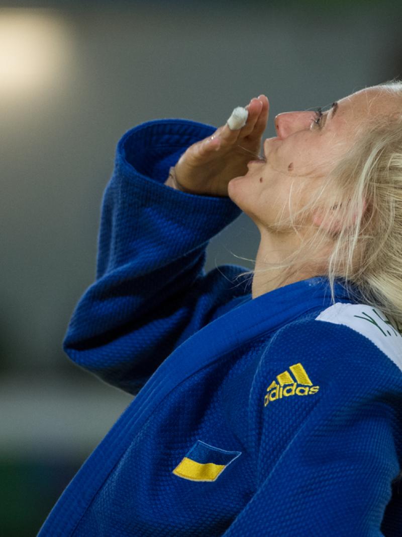 female judoka Yuliya Halinska blows a kiss to the sky