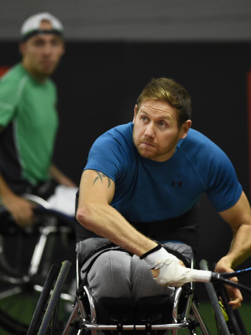 male wheelchair tennis players Antony Cotterill and Andy Lapthorne in action on the court