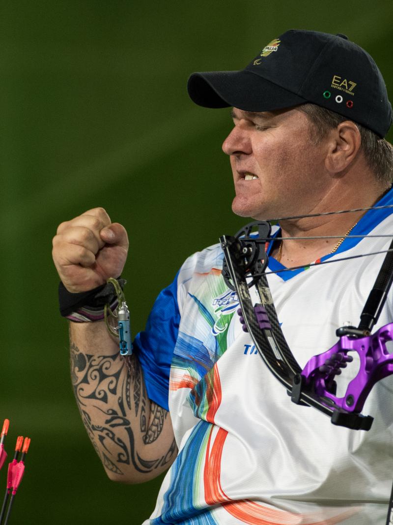 male Para archer Alberto Simonelli celebrates a clean shot
