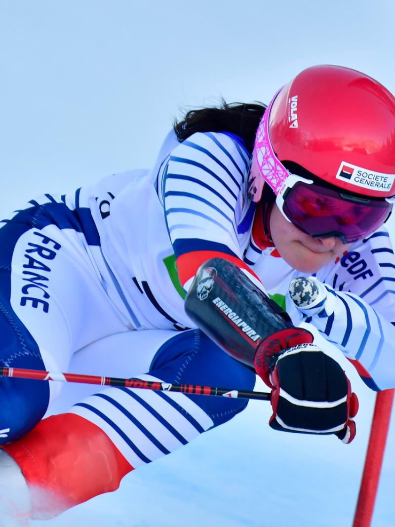 A female alpine skier competing