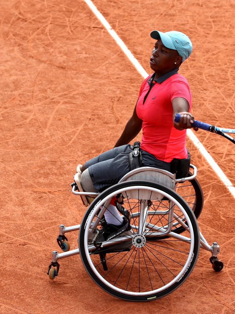 South African wheelchair tennis player Kgothatso-Montjane playing on clay