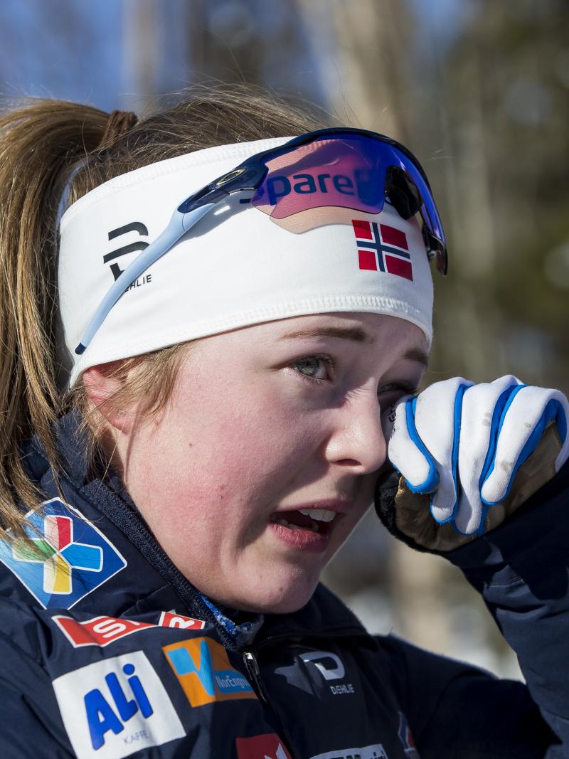 female Para Nordic skier Vilde Nilsen wipes away a tear
