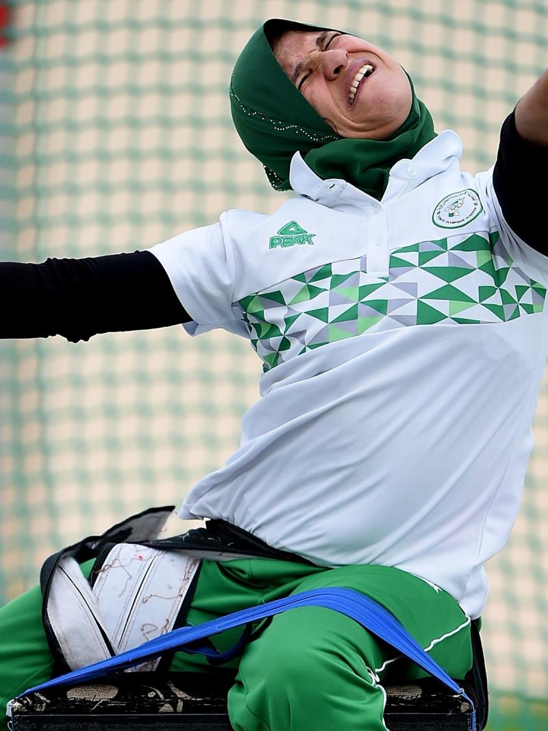 Female Para athlete Mounia Gasmi throws a discus