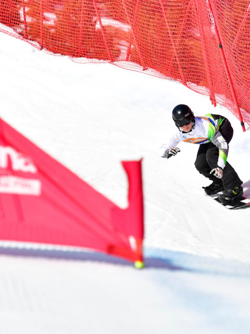 A man snowboarding