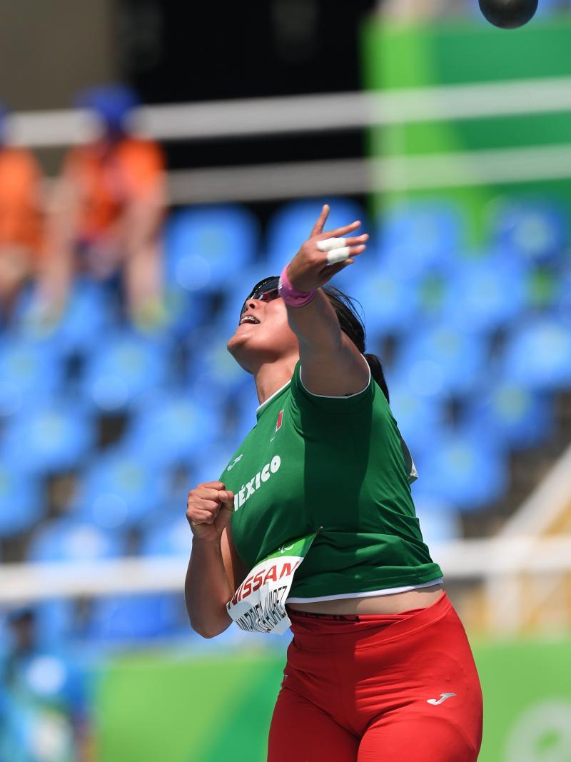 female Para athlete Rebeca Valenzuela Alvarez throws the shot put