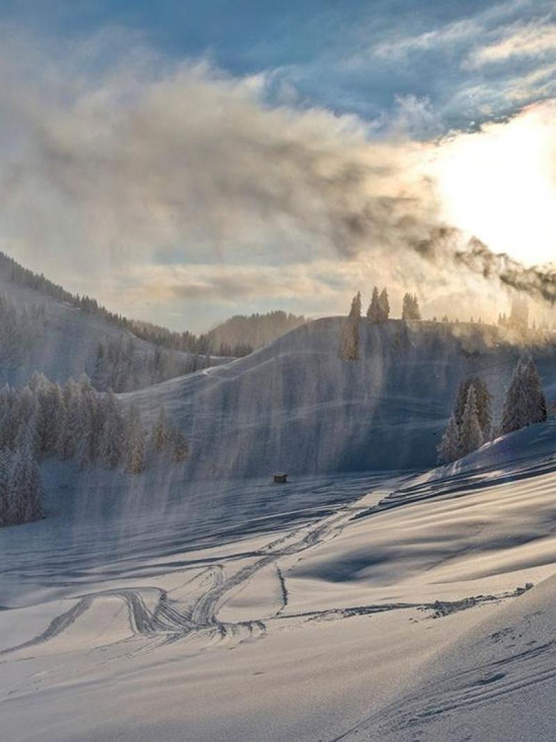 A snow making machine in the middle of snow