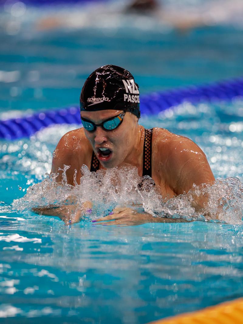A woman swimming breaststroke