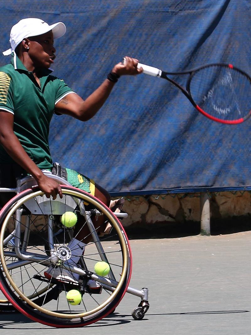 South African wheelchair tennis player Kgothatso Montjane ready to hit a backhand 