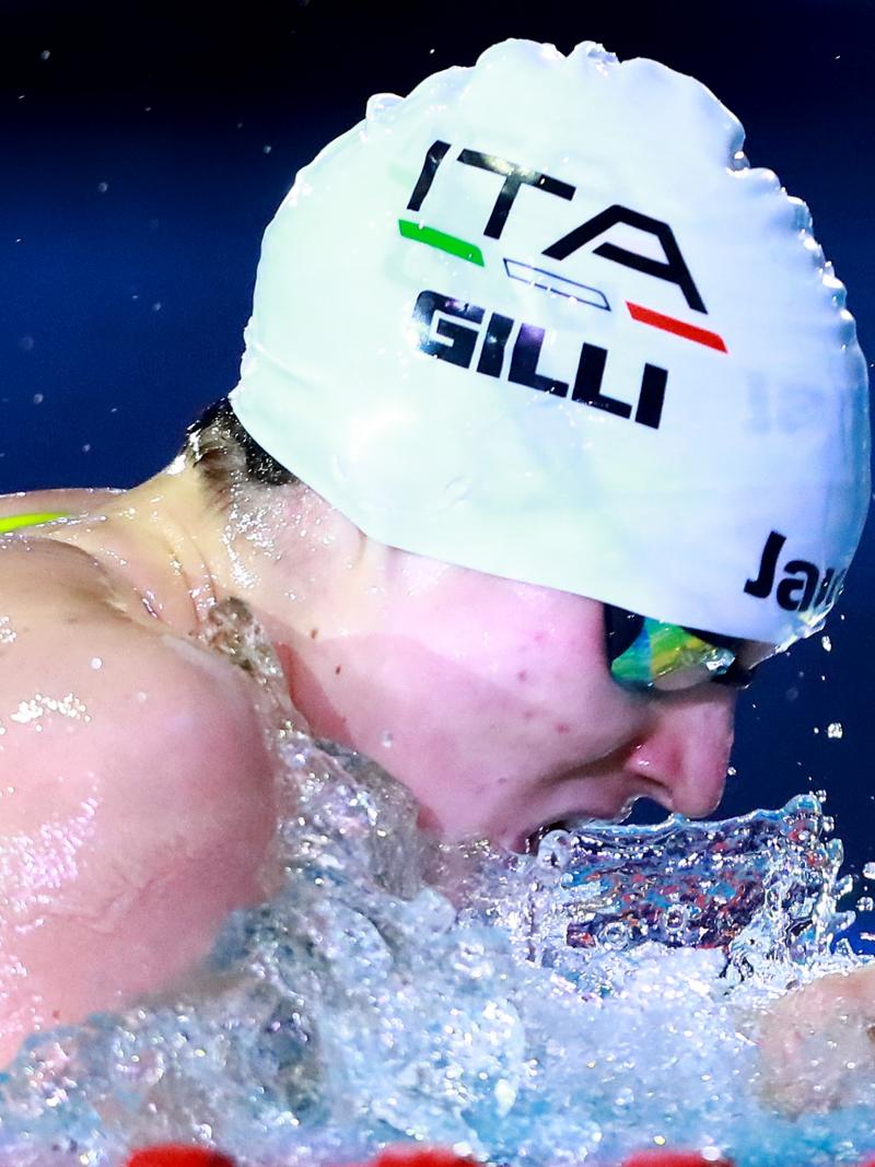Profile of Carlotta Gilli while swimming during a competition