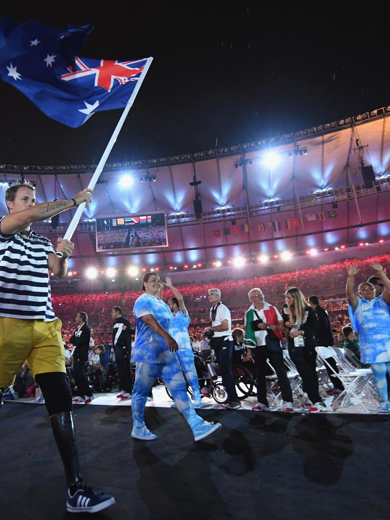 Australian Paralympian Curtis McGrath carries the country's flag at the Opening Ceremony of Rio 2016