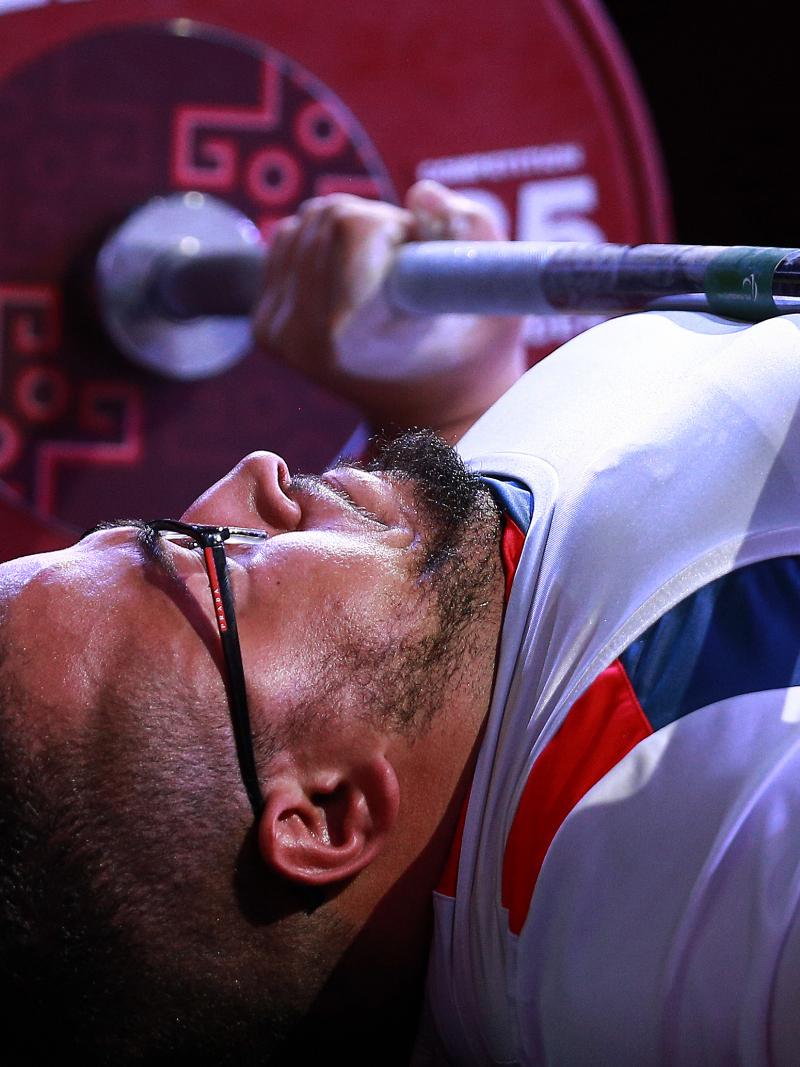 French powerlifter Rafik Arabat lifts the bar