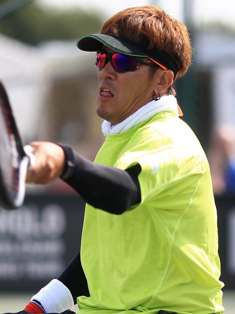 Koji Sugeno hits a forehand