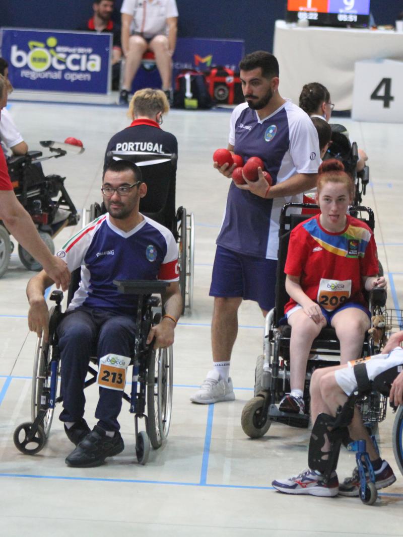 Russian boccia players with their coach
