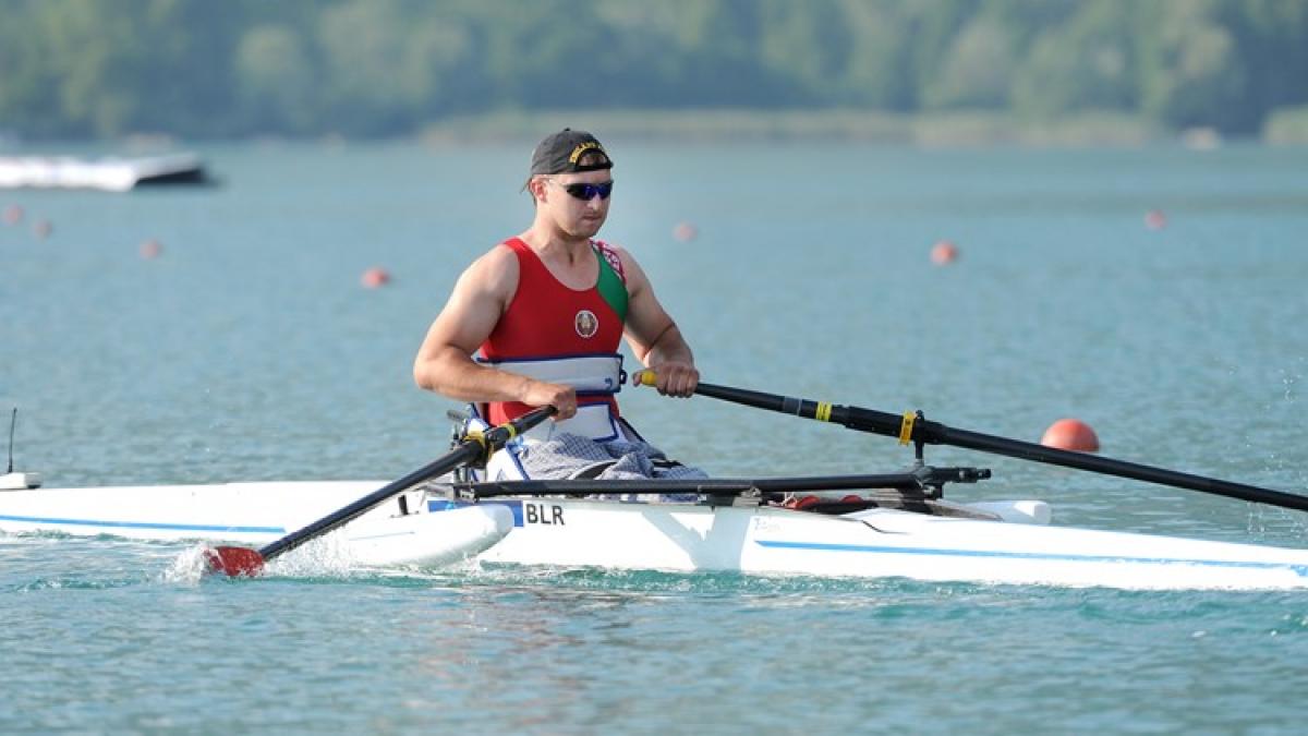 Man sits in rowing boat