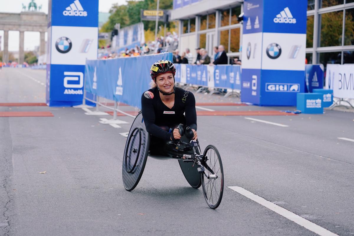 A female wheelchair racer on the streets of Berlin