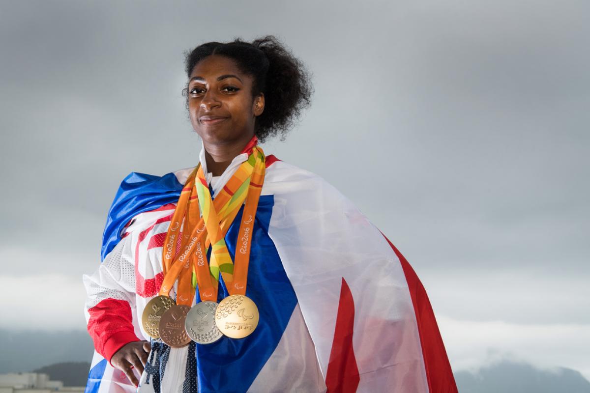 British athlete Kadeena Cox posing with her four medals from the Rio 2016 Games
