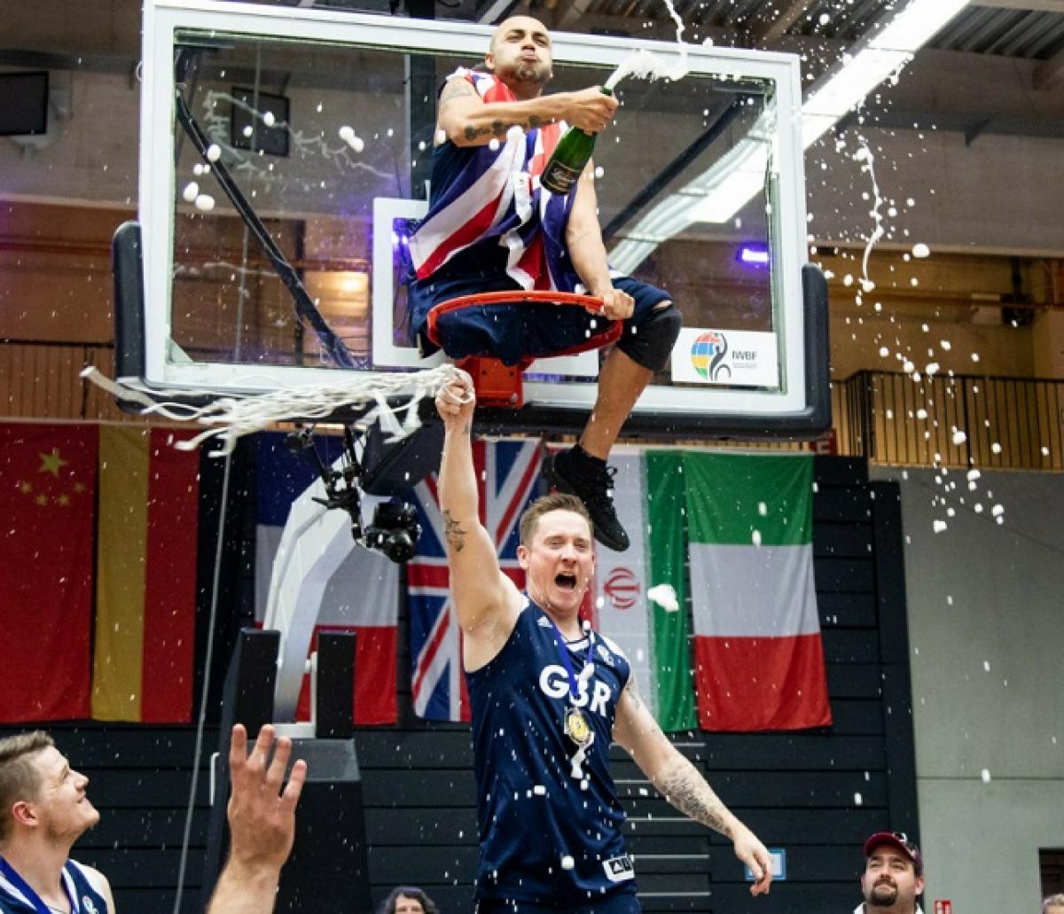 Great Britain players celebrate the Wheelchair Basketball World Championships title in Hamburg