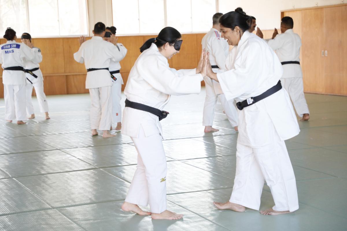 Para judokas training on the tatami