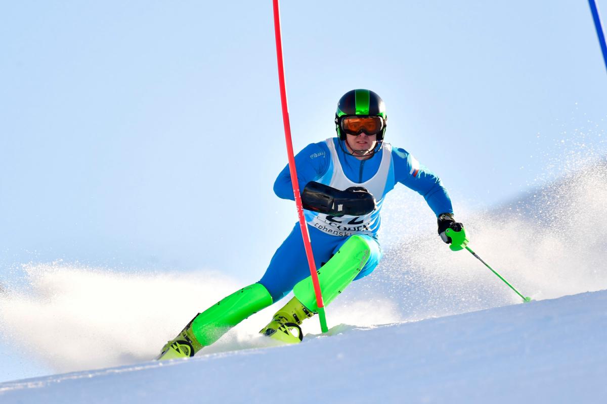 Russian male skier competes in the slalom