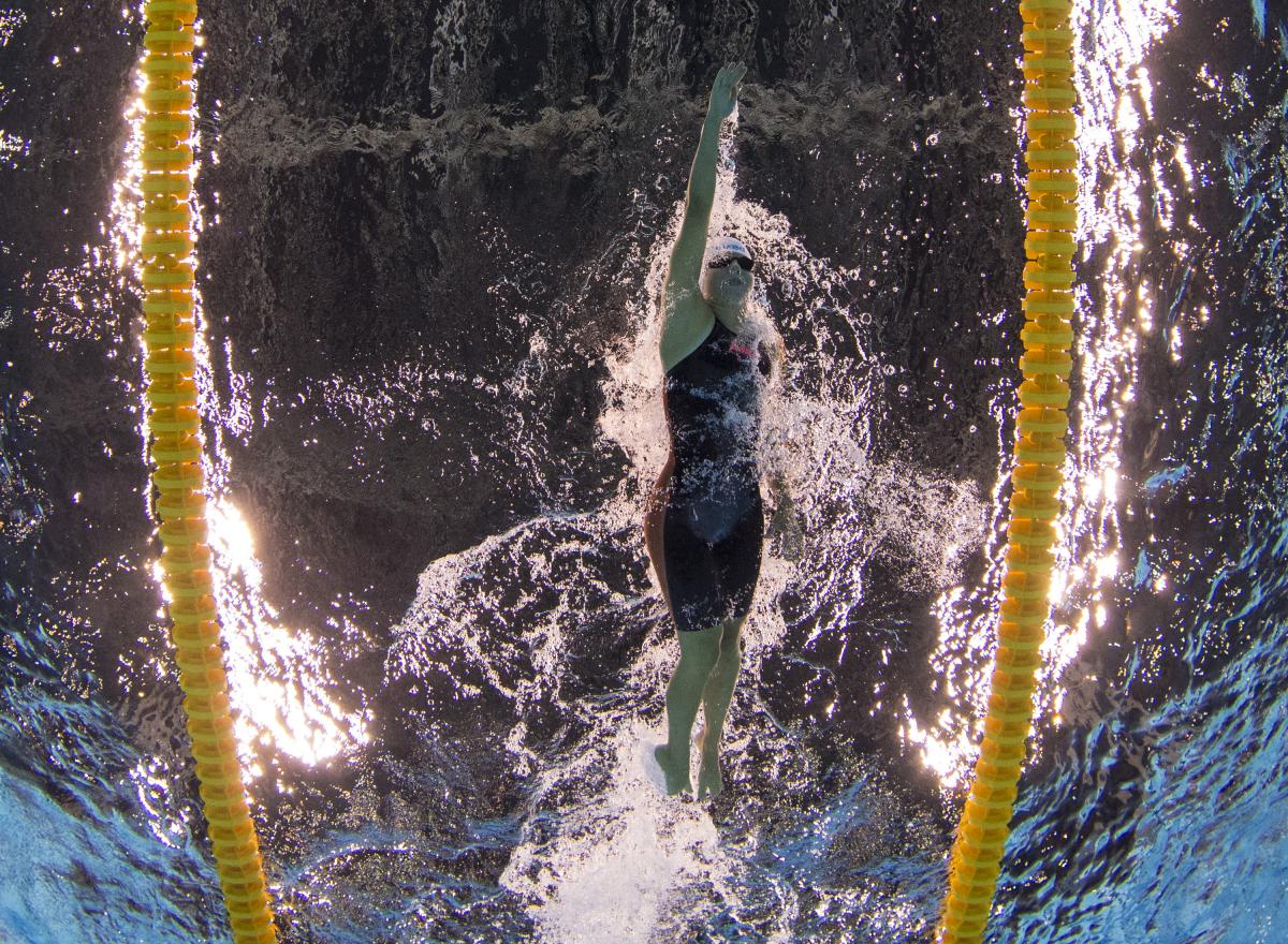 The underwater image of a female swimmer