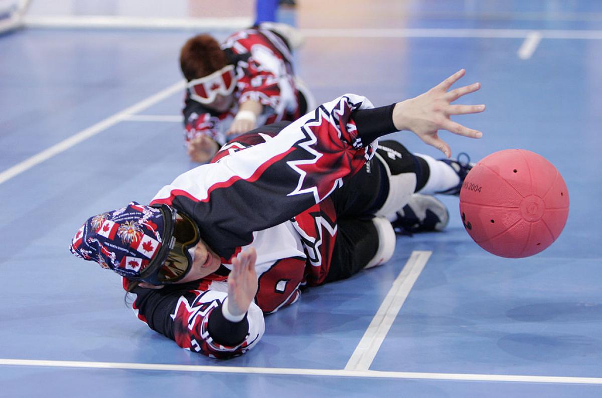 Canadian female goalball player makes a diving block