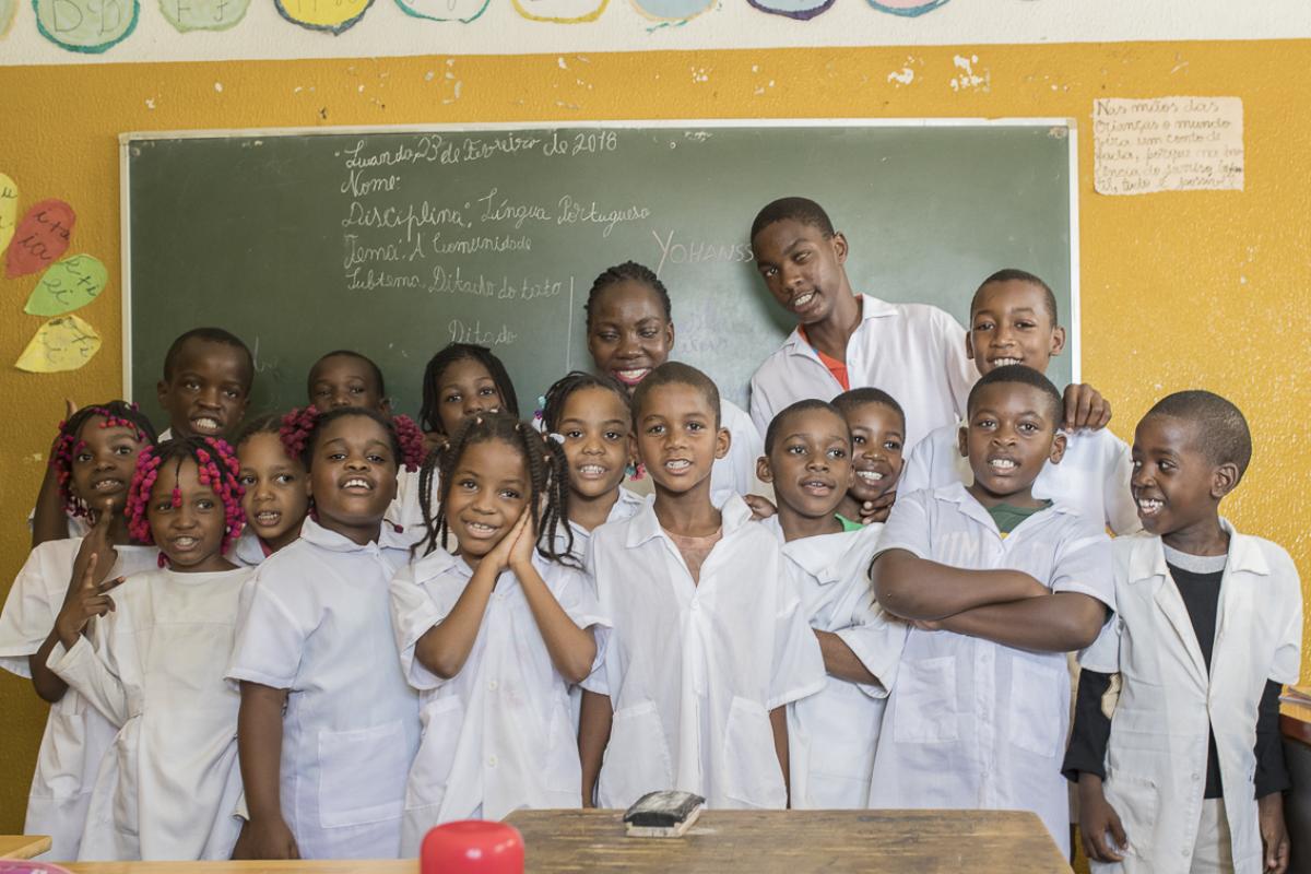 Angolan Para athlete and teacher Esperanca Gicasso at school with her students