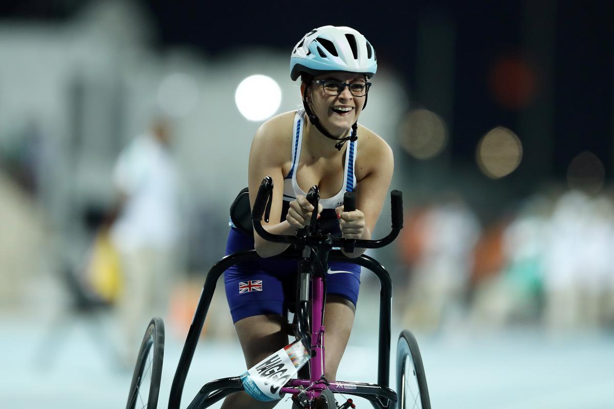 A female athlete competing using a RaceRunner