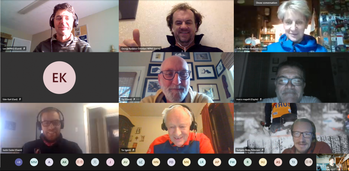 A computer screen showing a Zoom call with the image of eight participants