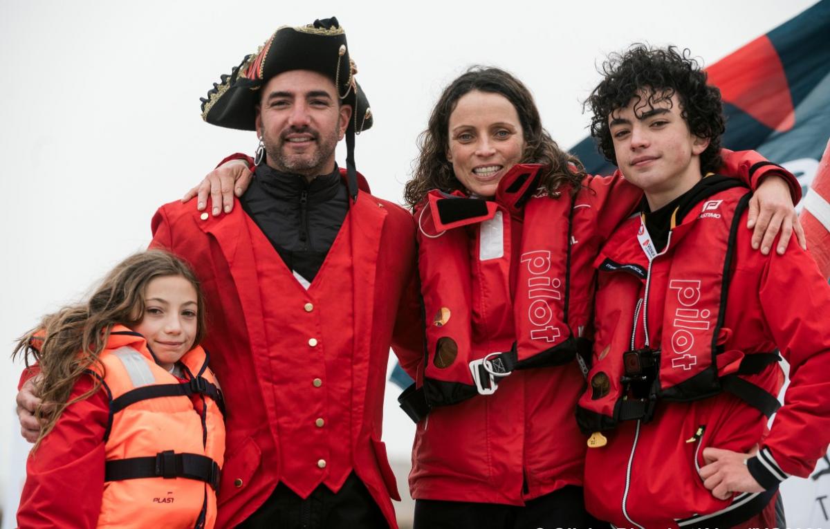 Male sailor with his wife and two kids