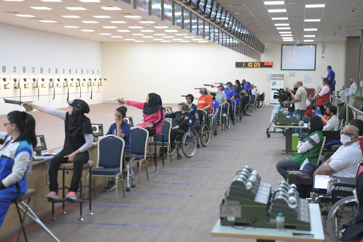  Sareh Javanmardi competing in the pistol event at the Al Ain World Cup 2021 alongside 12 other athletes 