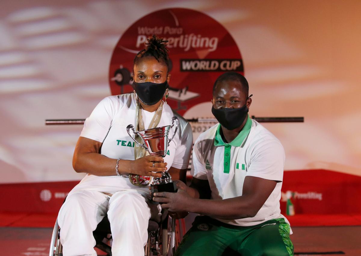 Nigeria team holding the World Cup trophy