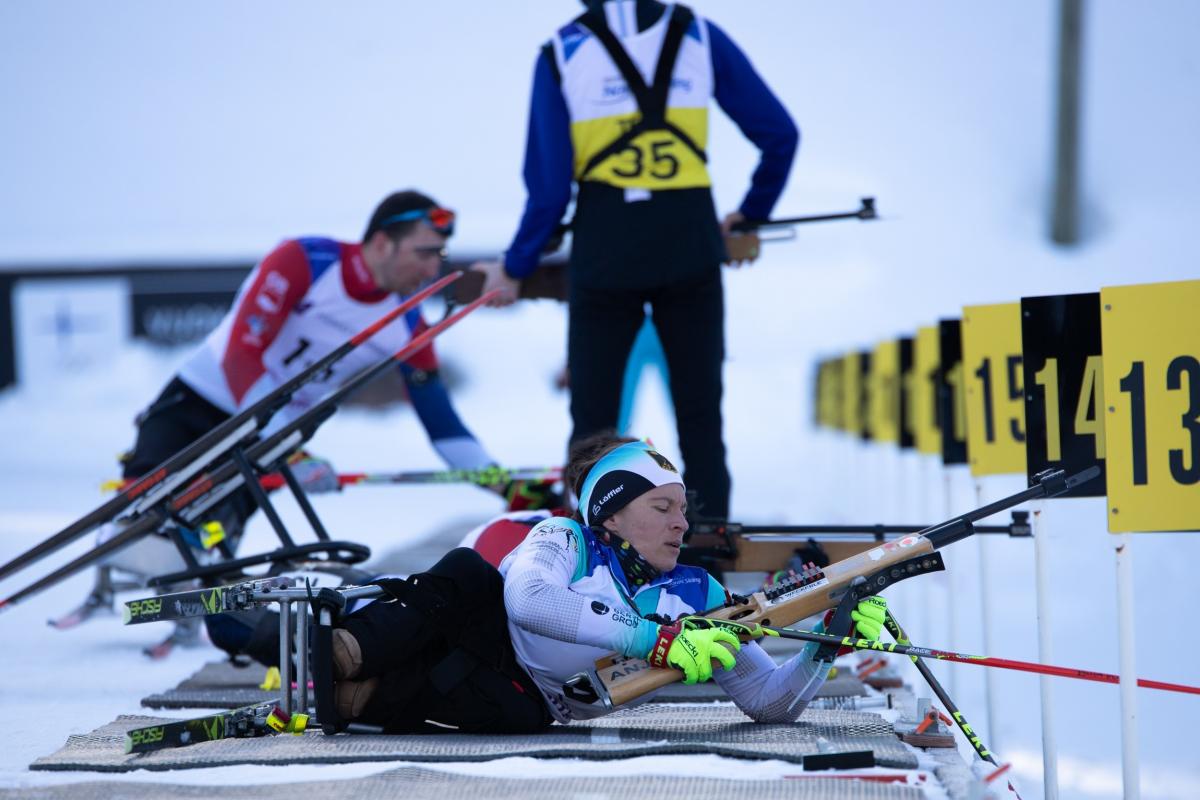 Anja Wicker preparing to shoot in the biathlon event